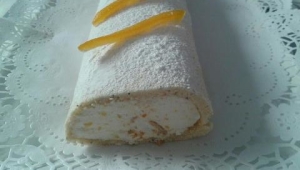 BRAZO DE GITANO CON NATA Y NARANJA CONFITADA